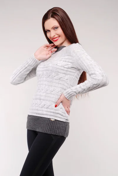 Portrait of a beautiful female model in knitted clothes — Stock Photo, Image
