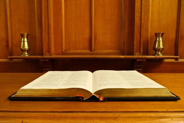 Old bible open in old chapel — Stock Photo, Image