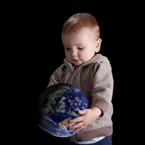 Boy holding the future world — Stock Photo, Image