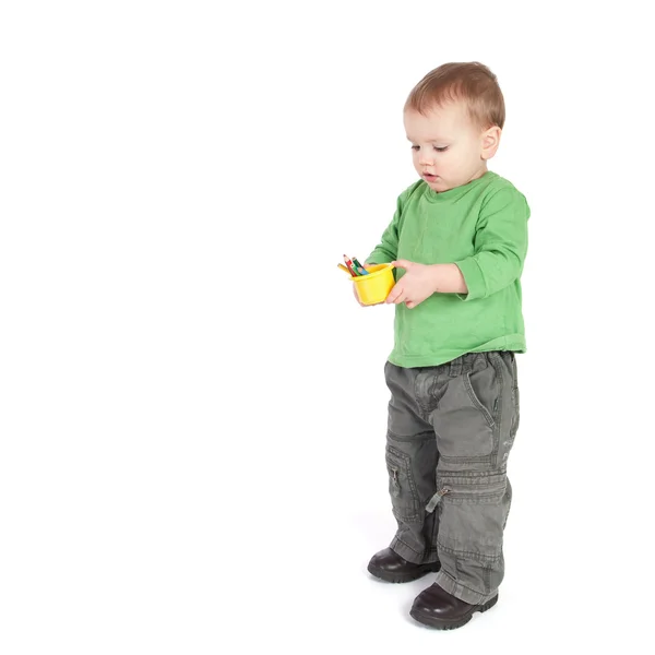 Toddler boy holding colored pencils — Stock Photo, Image