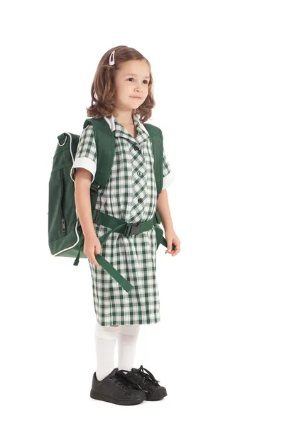 Školačka v uniformě s batohem — Stock fotografie