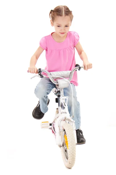 Ragazza in sella bambini bici — Foto Stock