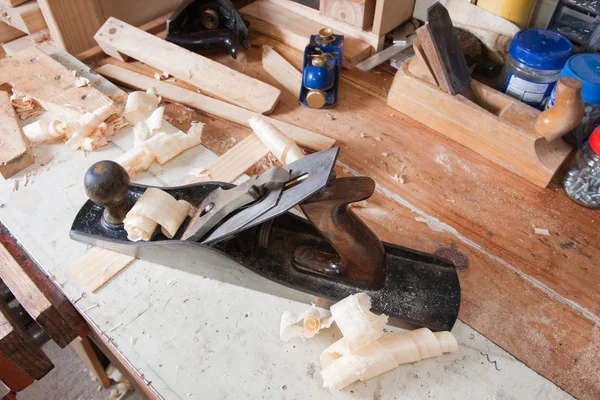 Jointing plane on workbench Stock Photo