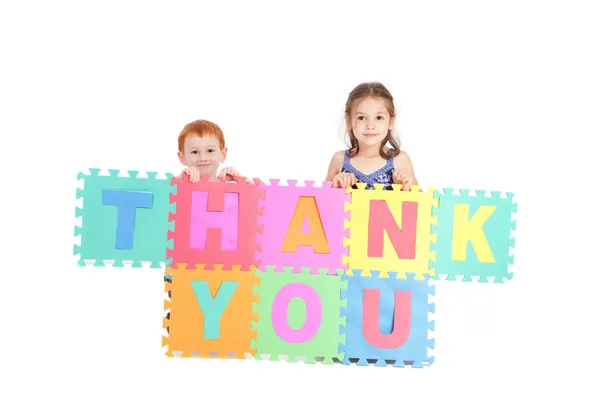 Děti, říká a psaní Děkuji Royalty Free Stock Fotografie