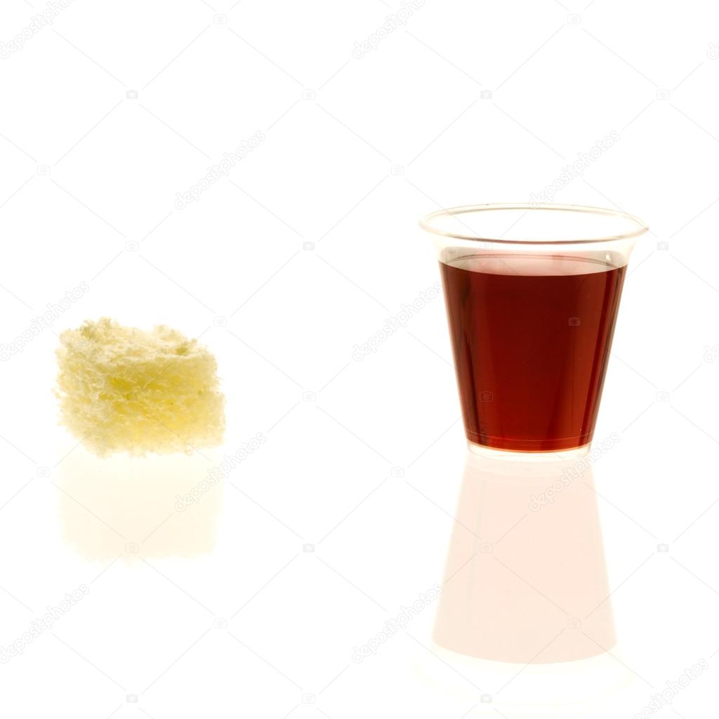 Plastic communion cup with wine and bread