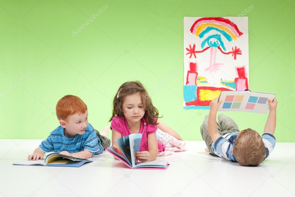 Young kids reading books