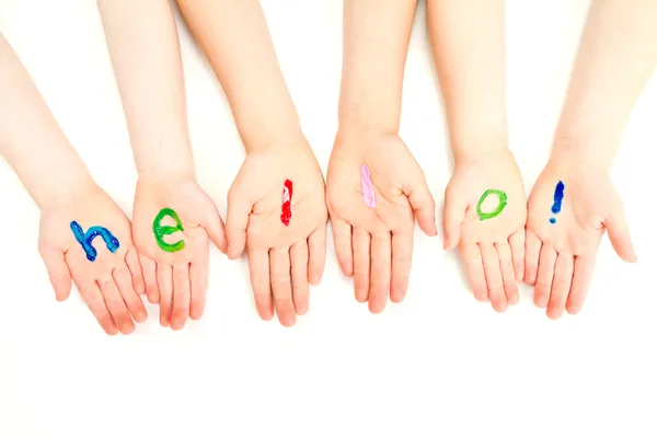 Kids hello welcome painted on hands — Stock Photo, Image