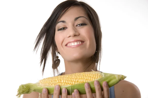 Beautiful Brunette holds a corn stalk — Stock Photo, Image