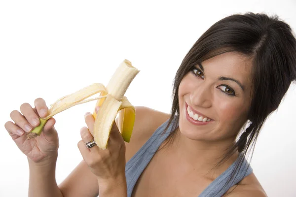 Bella Bruna tiene una banana — Foto Stock