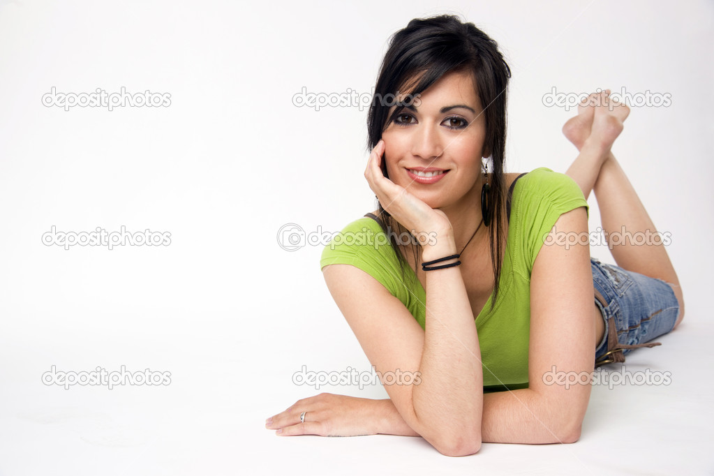 Woman Relaxed Laying on Belly Candid Pose Looking at Camera