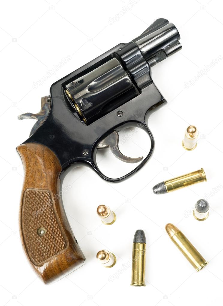 Wood Handled Revolver 38 Caliber Pistol Loaded Laying With Bulli Stock  Photo by ©cboswell 23904687