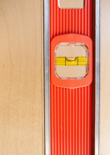 Old Door Gets Installed Leveled up By Long Orange Level Tool — Stock Photo, Image