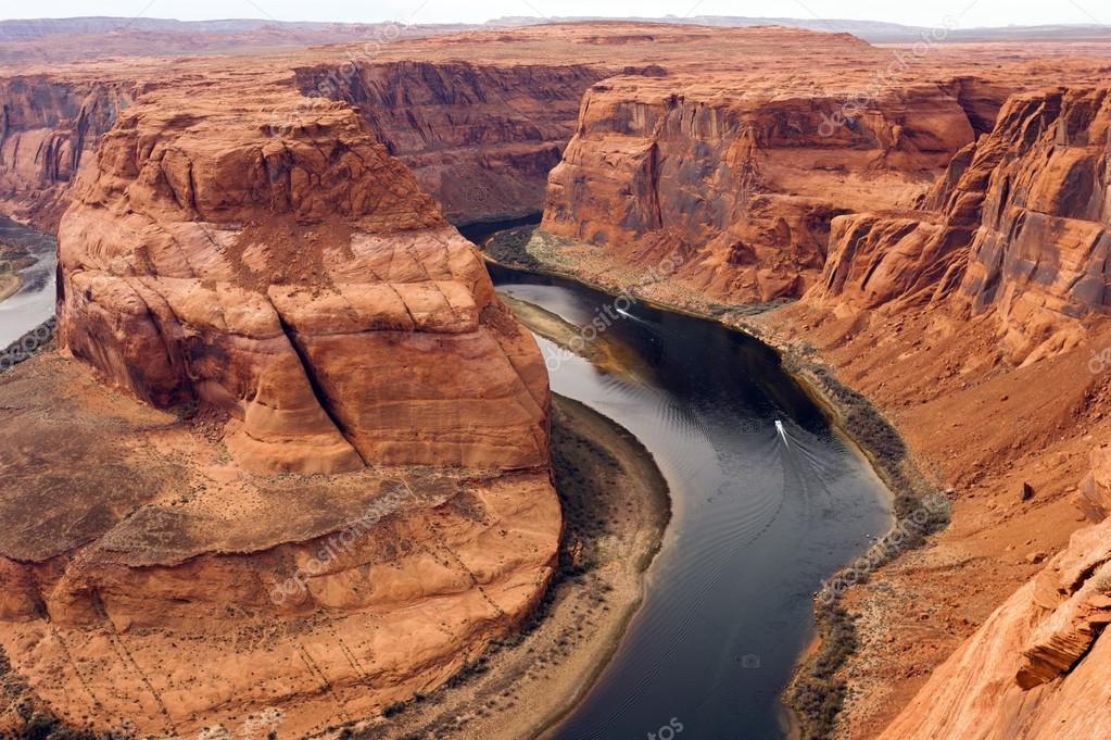 Two Boats Navigate Colorado River Deep Canyon Horseshoe Bend Southwest