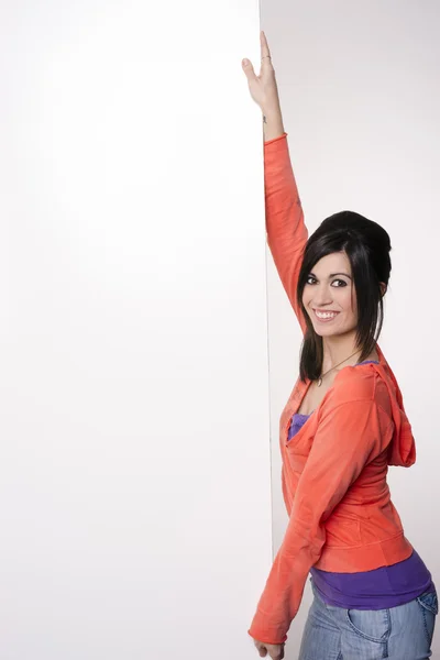 Female Presenter Stands At Blank White Board Smiling Woman — Stock Photo, Image