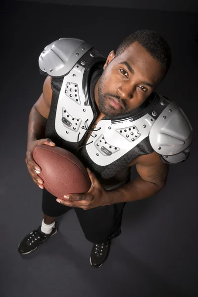 African American Man Football Player Shoulder Pads Looking At Camera — Stock Photo, Image