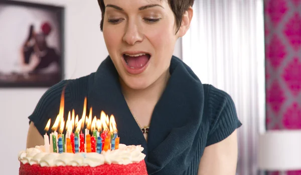 Attractive Female Readies to Blow Out Birthday Cake Candles — Stock Photo, Image