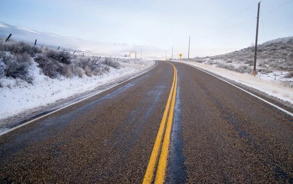 Snake river valley road ranč sníh padá venkovské zemědělské krajiny — Stock fotografie