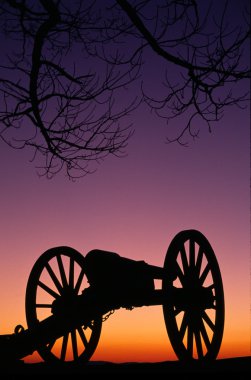War Memorial Wheeled Cannon Military Civil War Weapon Dusk Sunset clipart