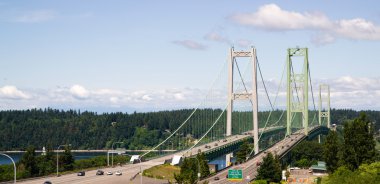 Highway 16 Crossing Puget Sound Over Tacoma Narrows Bridge clipart