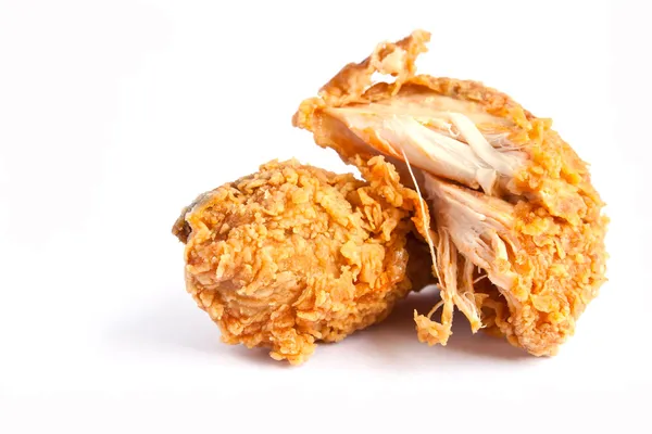 Cosce di pollo fritto marrone dorato — Foto Stock