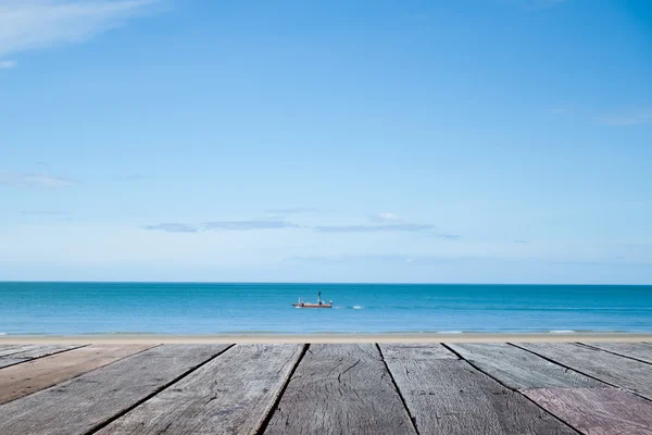 Sky and ocean with wooden berth — Stock Photo, Image