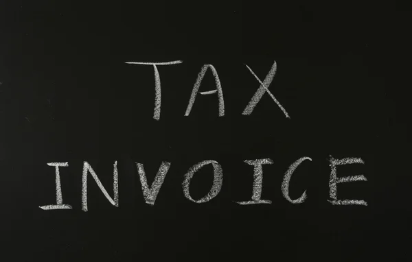 Word "tax invoice" on blackboard — Stock Photo, Image