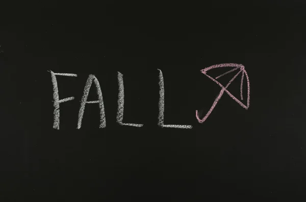 Desenho palavra "cair" no quadro negro — Fotografia de Stock