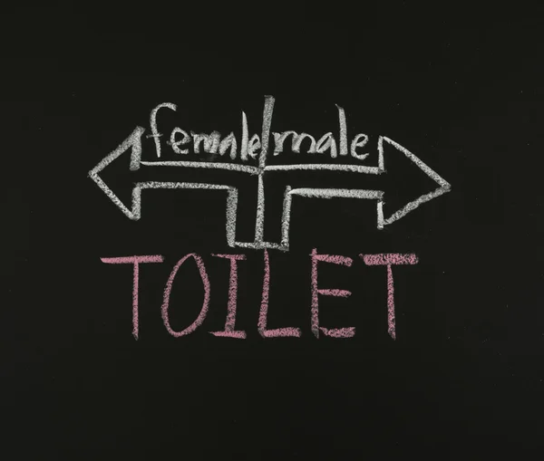 Toilet sign on blackboard — Stock Photo, Image