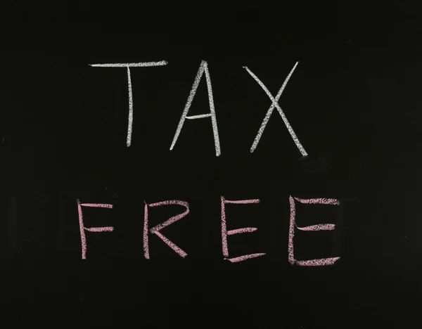 Слово "tax free" на доске — стоковое фото