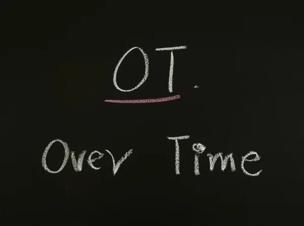 OT, over time — стоковое фото