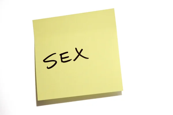 Yellow note paper with word SEX written — Stock Photo, Image