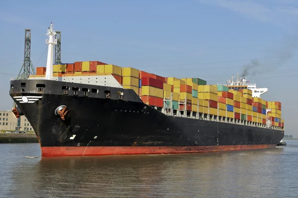 Container ship sailing into port Jogdíjmentes Stock Képek