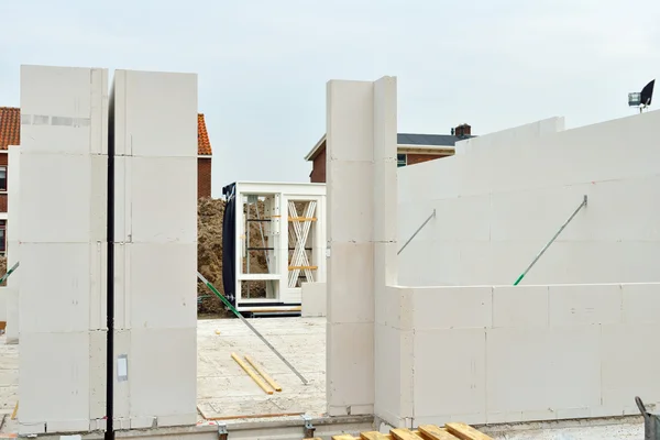 Building new homes with sandstone bricks — Stock Fotó