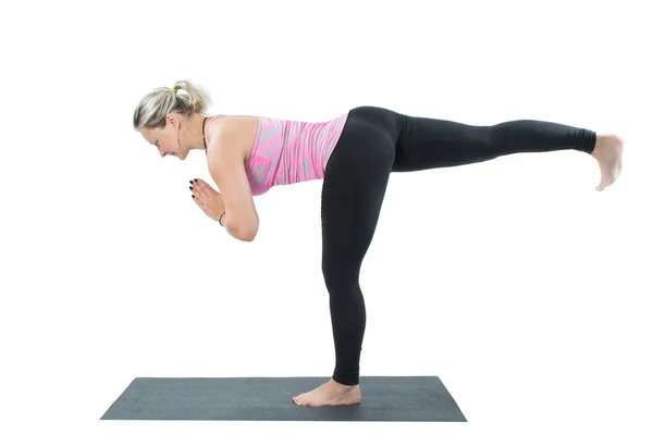 Jonge vrouw oefening yoga pose - geïsoleerd op witte achtergrond — Stockfoto