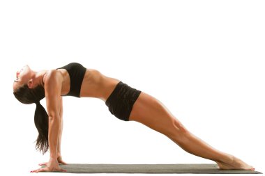 Young woman in sports bra on yoga pose clipart