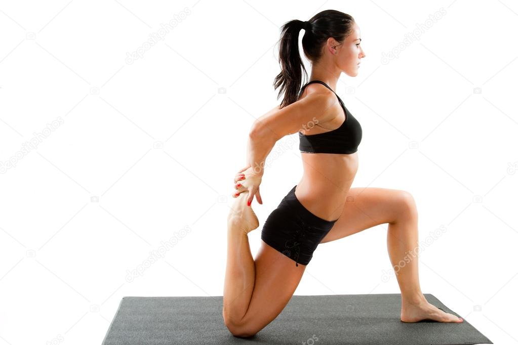 Fitness woman make stretch on yoga and pilates pose on isolated white backg