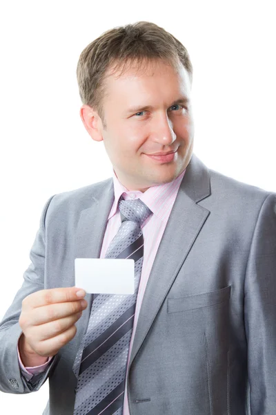Portrait of handsome business man with blank card isolated on white backgr — Stock Photo, Image