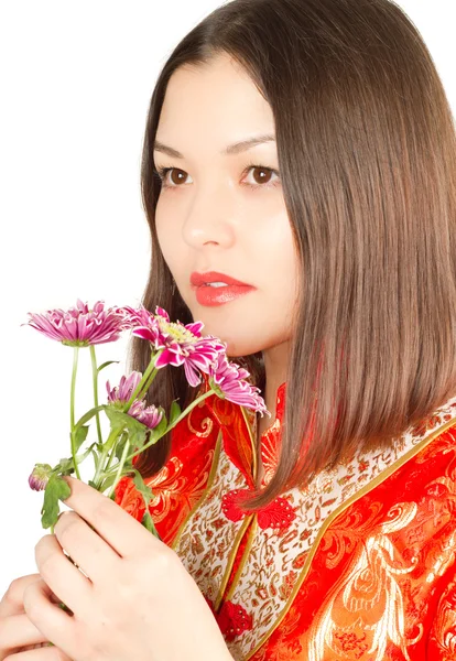 Mulher asiática em Kimono em um fundo branco — Fotografia de Stock