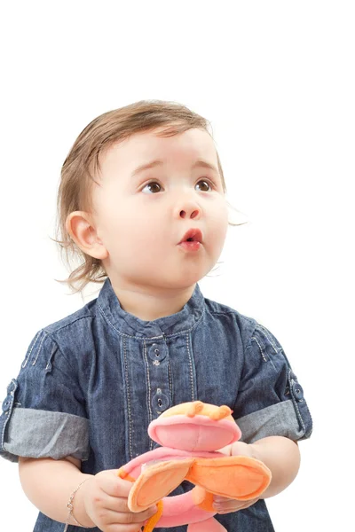 Schattig klein babymeisje met speelgoed in de studio, geïsoleerd op witte backgro — Stockfoto