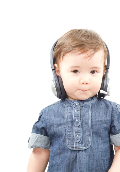 Retrato de bebé niña en auriculares aislados sobre fondo blanco —  Fotos de Stock
