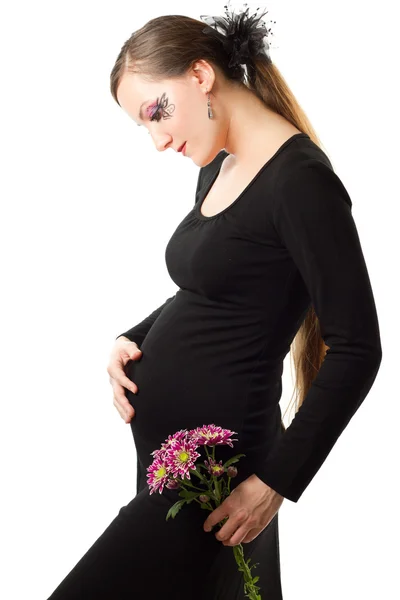 Jovem grávida com corpo arte borboleta no rosto com chrysant flor — Fotografia de Stock