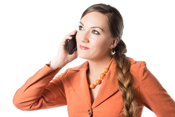 Beszél egy mozgatható telefon egy fehér háttér üzletasszony portréja — Stock Fotó