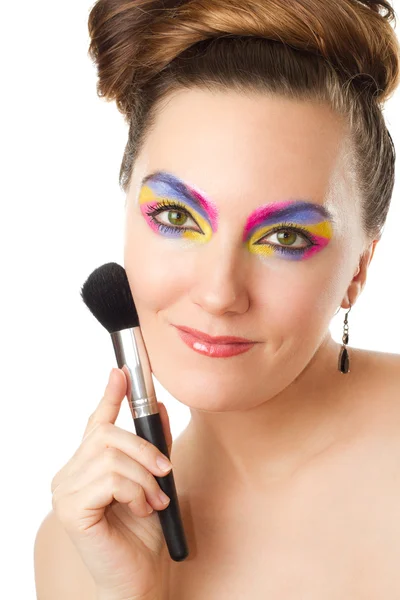 Portrait of pretty woman with professional make-up and brush for powder, is — Stock Photo, Image