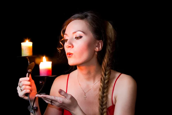 Portrait of a girl candle lights a match on New Year — Stock Photo, Image