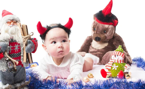 Santa menina e brinquedo no Natal em fundo branco isolado O conceito de infância e férias — Fotografia de Stock