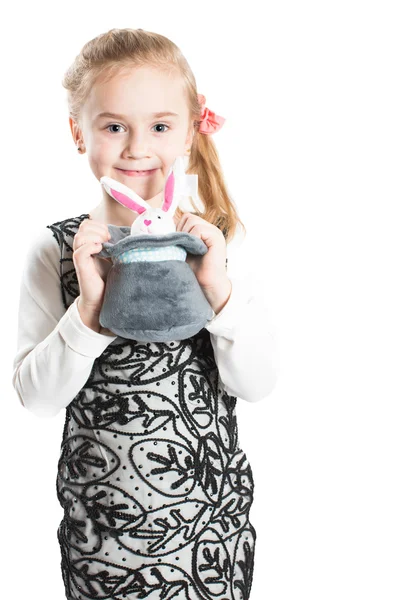 Hermosa niña con juguete sobre fondo blanco aislado — Foto de Stock