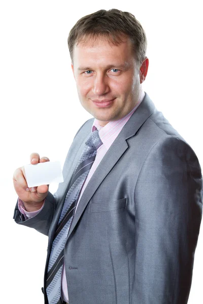 Retrato de homem de negócios bonito com cartão em branco isolado no fundo branco. Conceito de negócio e sucesso — Fotografia de Stock