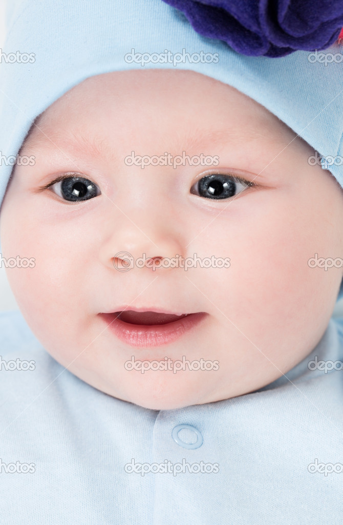Portrait of baby girl with blue eyes isolated on white background Use it for a child, parenting or love concept