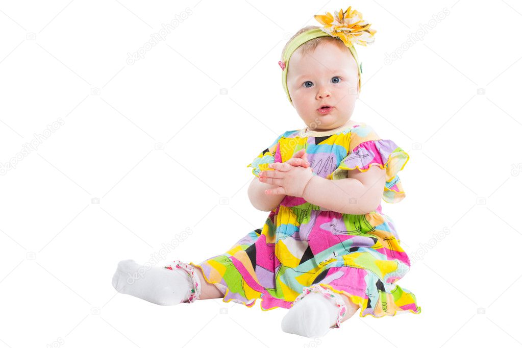 Pretty child girl claps his hands isolated on white background. Child's Play ladushki
