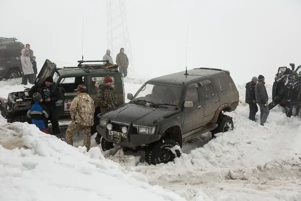 Almaty, Kazakhstan - February 21, 2013. Off-road racing on jeeps, Car competition, ATV. — Stock Photo, Image